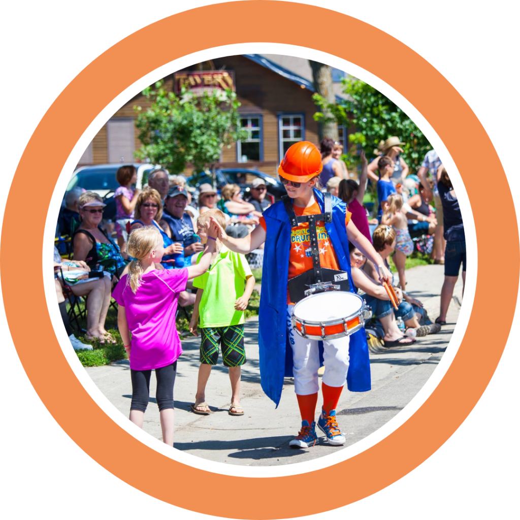 A Kracker Jacker giving a girl a highfive