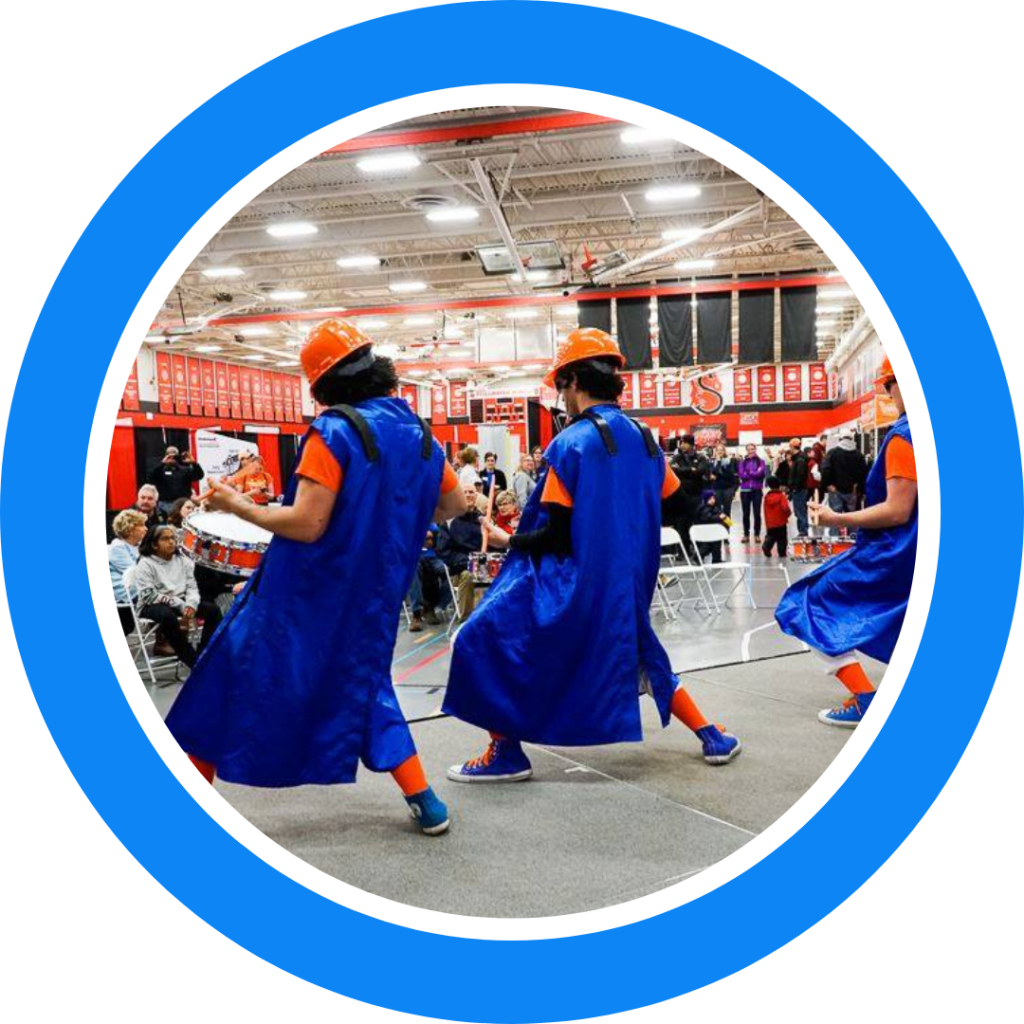 The Kracker Jacks Drumline playing at a business expo